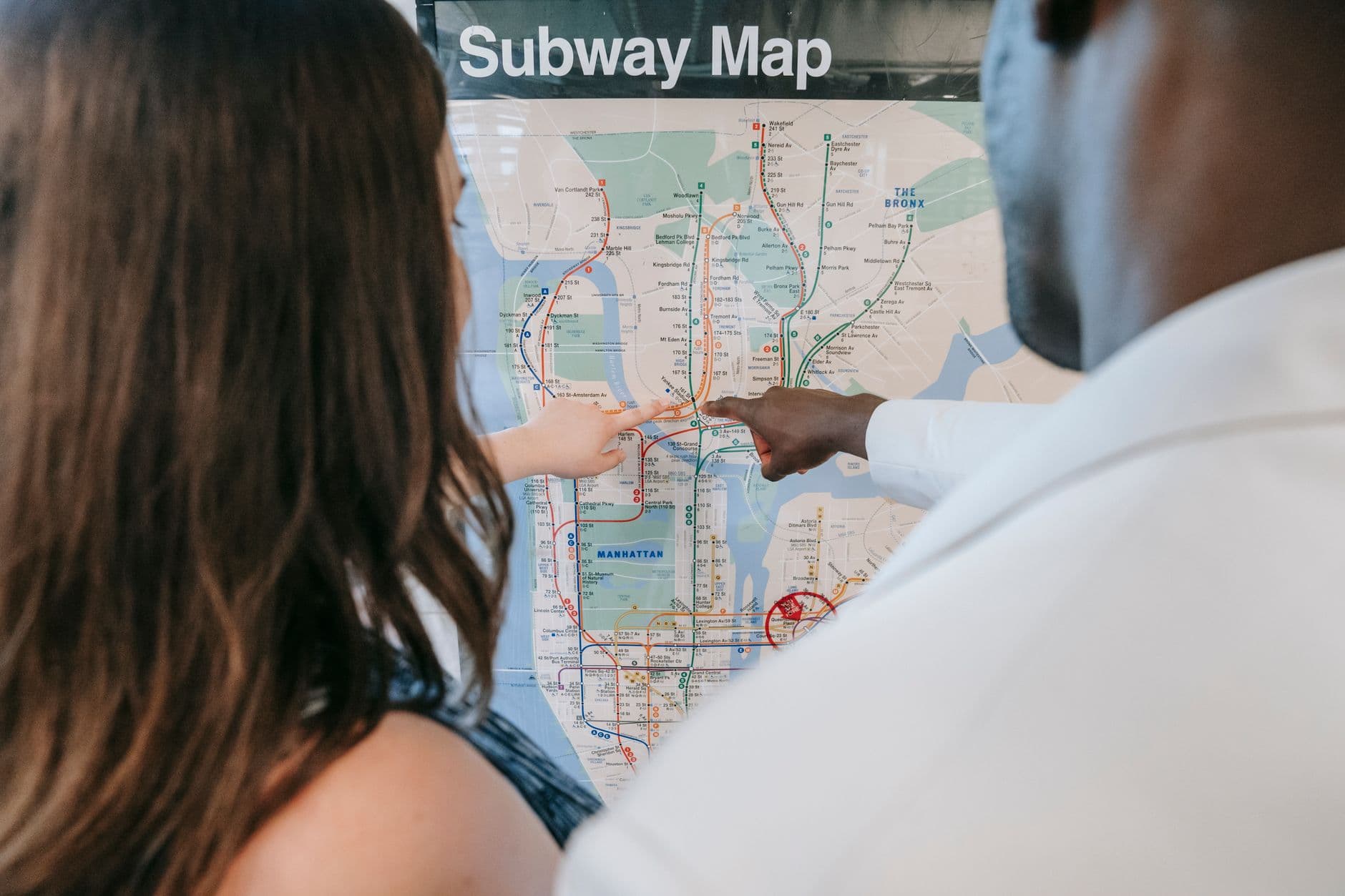 A couple examining a map together.